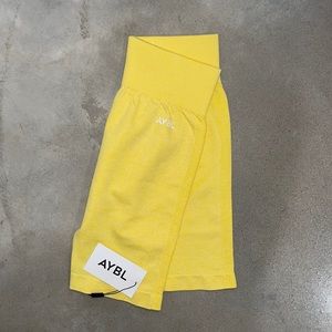 Yellow medium sized Aybl motion seamless cycling shorts. Never worn!